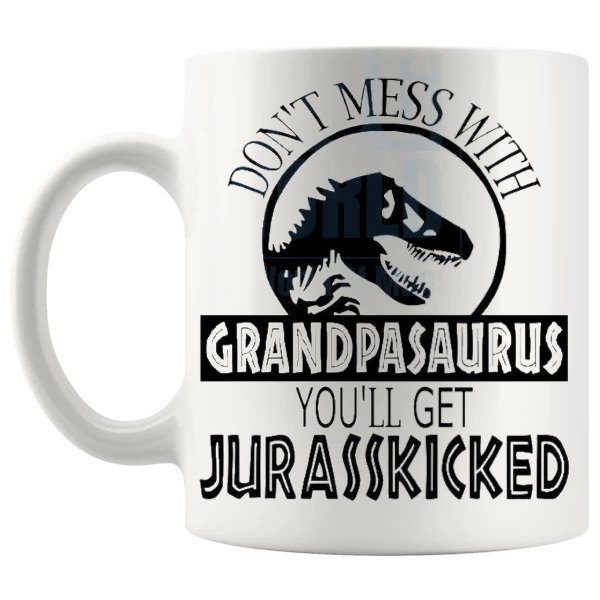 Don't Mess With The Grandpasaurus Mug funny dinosaur gift for Grandad shown with handle on the left