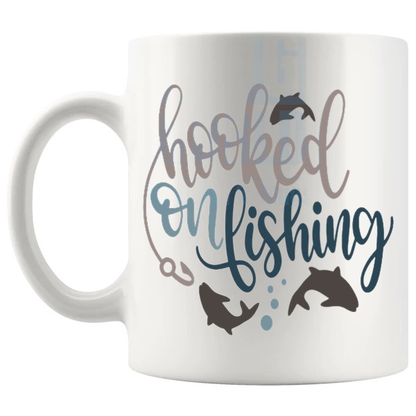 Hooked On Fishing Mug funny fishing gift shown with handle on the left