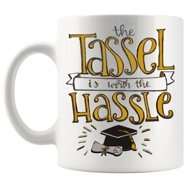 The Tassel Is Worth The Hassle Mug funny graduation gift shown with handle on the left