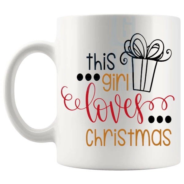 This Girl Loves Christmas Mug cute christmas gift design on a white mug shown with handle on the left