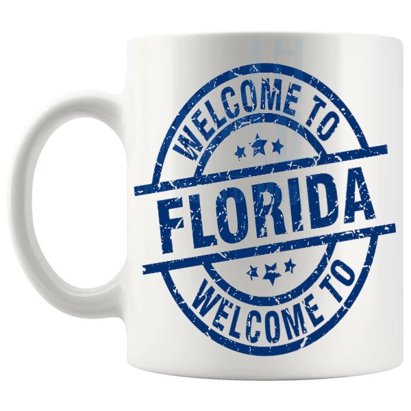 Welcome To Florida Mug travel gift for anyone who loves Florida shown with handle on the left