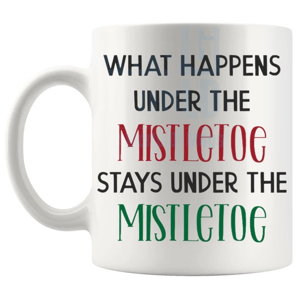 What Happens Under The Mistletoe Mug flirty christmas gift design on a white mug shown with handle on the left